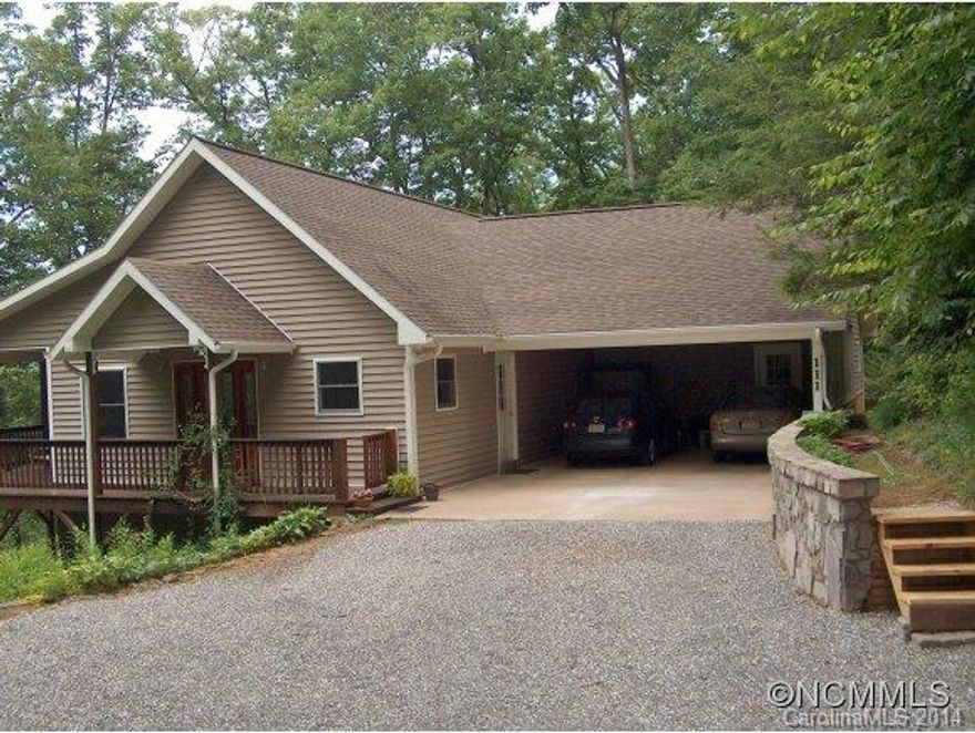 You will appreciate the owner's meticulous attention to detail.  This special home features a bright and open great room, dining and kitchen with vaulted ceiling. Opens to a lg. covered deck for your morning coffee. main floor Master Ste. included lg. bath, walk in closet and office/mud room. Family room, 2 lg. bedrooms, jack & jill bath and workshop on the lower level. Attached 2 space carport with access inside. A natural low maintenance yard.