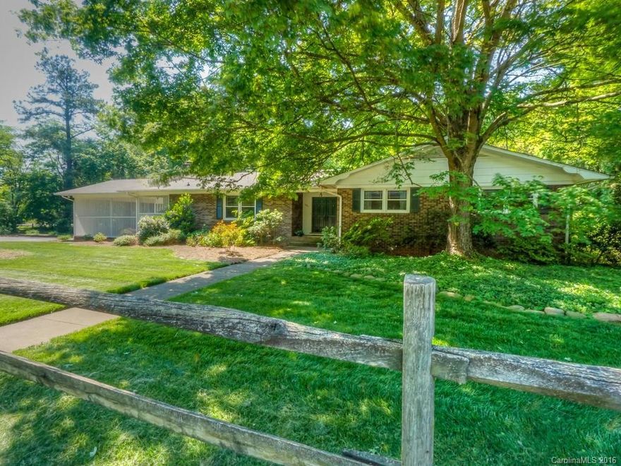 Spacious ranch in lovely neighborhood less than a mile from Main St shopping, restaurants, Farmers Market, Village Green, Library & Davidson College. Short walk through the EcoTrail to Davidson Elementary; very short walk to the Greenway. This 4 BR / 3 full bath home has a guest suite (BR #4) with full bath, family/rec room, office and storage in the walkout basement. Enjoy the mature trees (and empty lot) in the backyard from the large screen porch or yard. An in-town gem!