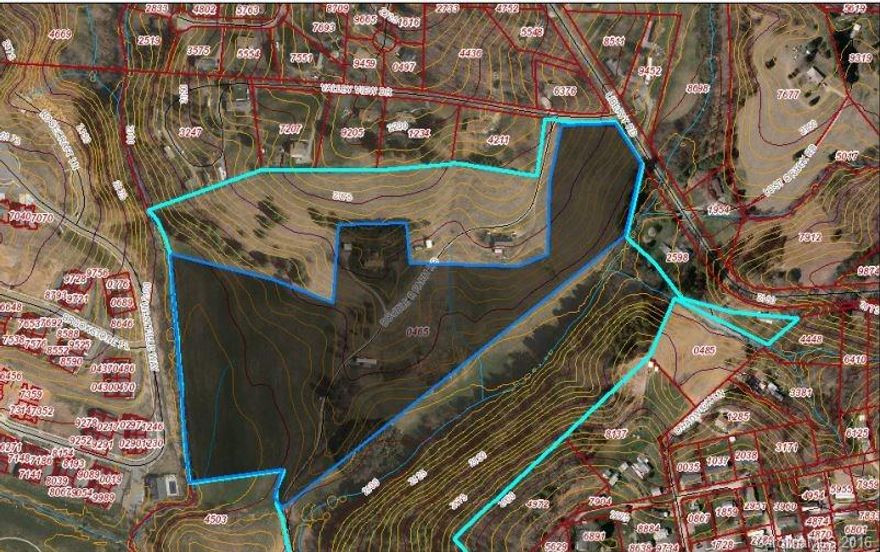 INVESTORS: Portion of pin, just over 19 acres. 14.25 acres has been sold, not included. Located at future off ramp for the new Liberty I-40 Interchange.  We estimate DOT will purchase about 7 acres of this parcel.  It has a house and single wide trailer on it.  Post-DOT acquisition, we believe there will be an 11 acre parcel (great for retail or motel) and a 1.5 acre parcel remaining from that would be ideal for a gas station.  See Liberty Rd I-40 Interchange website. Call us for more details.