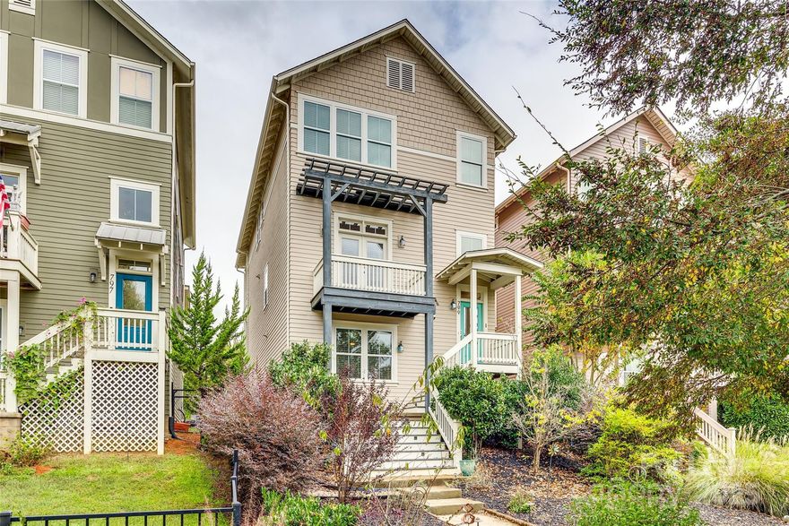 Gorgeous 4 bedroom, 3.5 bath home in the beautiful Riverwalk of Rock Hill! Garage entry on the lower level boasts a mud room w/drop zone, a nice-sized bedroom, and a full bath. The main level features an open floor plan,  formal dining room which leads to a front balcony, and a large kitchen. The kitchen boasts upgraded 42" walnut cabinets, tiled backsplash, granite countertops, SS appliances, an island, and a breakfast bar. The kitchen opens to the family room with a gas log fireplace and leads to a large screened porch overlooking the Catawba River and Caroliana Thread Trail. The upper level has the Primary Bedroom, ensuite bath, a garden tub, a sep. shower, double sink vanity, WIC, and a covered balcony. Two secondary bedrooms on this level with a full hall bath. Laundry is on the upper level with washer/dryer included. Pets conditional. **NO Cats**. Community amenities include pool w/lazy river, playground, bike and walking trails, Kayak launch, Fine dining and more!