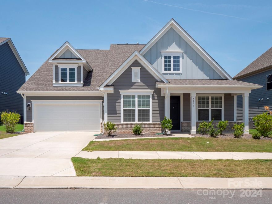 This like-new 4 bedroom, 4 and a half bath home is perfectly located in the highly sought after Massey neighborhood! 4011 Charlton is one of only a few "Pikewood" floor plans which centers around an immaculate, open-concept gourmet kitchen and cozy family room optimized for entertaining. Primary bedroom/bathroom on main level is designed for privacy with dual vanities, large walk in closet and dedicated shower enclosure. First floor laundry and two additional guest suites with study offer flow and ease of living. Exterior features include a covered front porch and screened in back patio on a large, flat lot. The upper level features a large game room, 4th bedroom as a private guest suite with full bathroom and walk in closet. Tankless water heater, electric car charging station in a good sized, two car garage round out this well-equipped home ready for its new owner! Don't miss this incredible opportunity to live close to shopping, dining, and great schools in the Massey Subdivision!