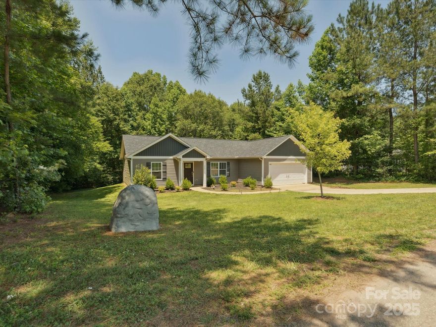 Fantastic spacious one level ranch-style home situated on 1.09 acres with "no HOA" in the lovely town of Stanley.  You will love the open floor plan, featuring a gorgeous kitchen with beautiful quartz countertops and an island breakfast bar, the GE electric range, microwave, dishwasher, and Whirlpool side-by-side refrigerator are all included.  The open great room and kitchen create a seamless flow, perfect for entertaining and everyday living.  The primary bedroom is spacious, and the primary bath suite boasts double vanities, a walk-in closet, a separate water closet, and a shower/tub combination.  The other two bedrooms are located on the opposite side of the home, providing privacy and comfort for the entire family.  There is also a separate laundry room.  Plus a two-car garage.  A copy of the floor plan and school assignments are available for your convenience in the photos.