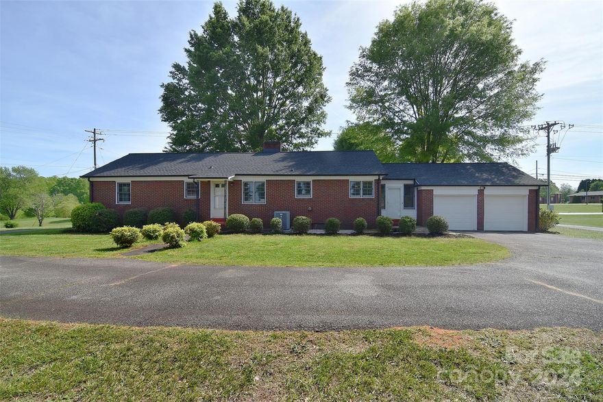 Step into the realm of opportunity at 1820 and 1822 E. Maiden Rd, where potential awaits! On 0.61 acres, 1820 E. Maiden Rd presents a distinguished full brick ranch, featuring a partially finished basement and a newly installed roof from 2022. With a 2-car garage and a functional two-room storage building, this property offers practicality and charm. 
Adjacent, on 0.54 acres, 1822 E. Maiden Rd seamlessly integrates with its counterpart, housing a single wide manufactured home securely affixed to the ground. This 1993 Fleetwood model, boasting 2 beds and 2 baths within its dimensions of 13.9ft x 66.5ft, embodies comfort and convenience that conveys with the sale. Collectively, these properties offer a generous 1.15 acres of potential! Sold as-is. Don't let this opportunity pass you by!