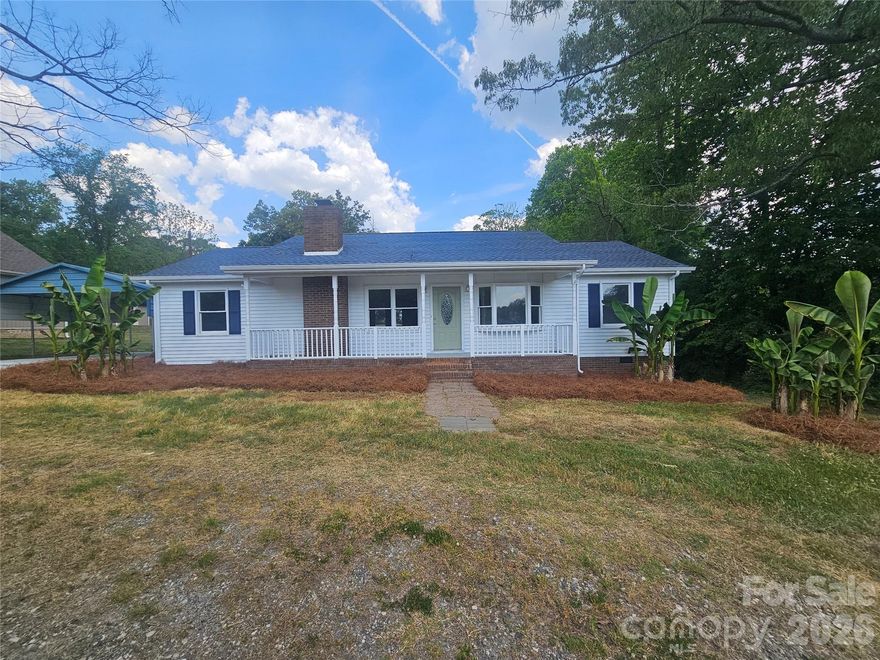 Wonderfully remodeled ranch home ready to go! New flooring, paint and lighting fixtures throughout with soothing greys and whites and silver touches. Kitchen has new countertops, backsplash and fixtures.  Stove can be gas or electric depending on your taste and an icemaker connection. Both full bathrooms have been updated and sparkle! Spread out in this split floorplan ranch and have a bonus space/office/playroom/storage room/whatever your heart desires. Another great perk is the mud room with its separate entrance, space for pantry shelving and electric or gas dryer hookup! Wait don't forget, the hot water tank is in there also but its tankless! Never wait forever for the water to heat up! Outside you can watch the sun come up on your covered front porch or grill with friends on the huge back deck overlooking the back yard.  Store all your yard tools or hobbies in the shed out back or in the walk-in crawl space below the house. Everything about this house screams welcoming, from the rocking chair front porch to the circle drive in front as well as the circle drive going around back.  Lastly enjoy the heart of Bessemer City with the community events, laid back downtown area, fun night life and charming side roads for walking and exercising by living just a minute away.