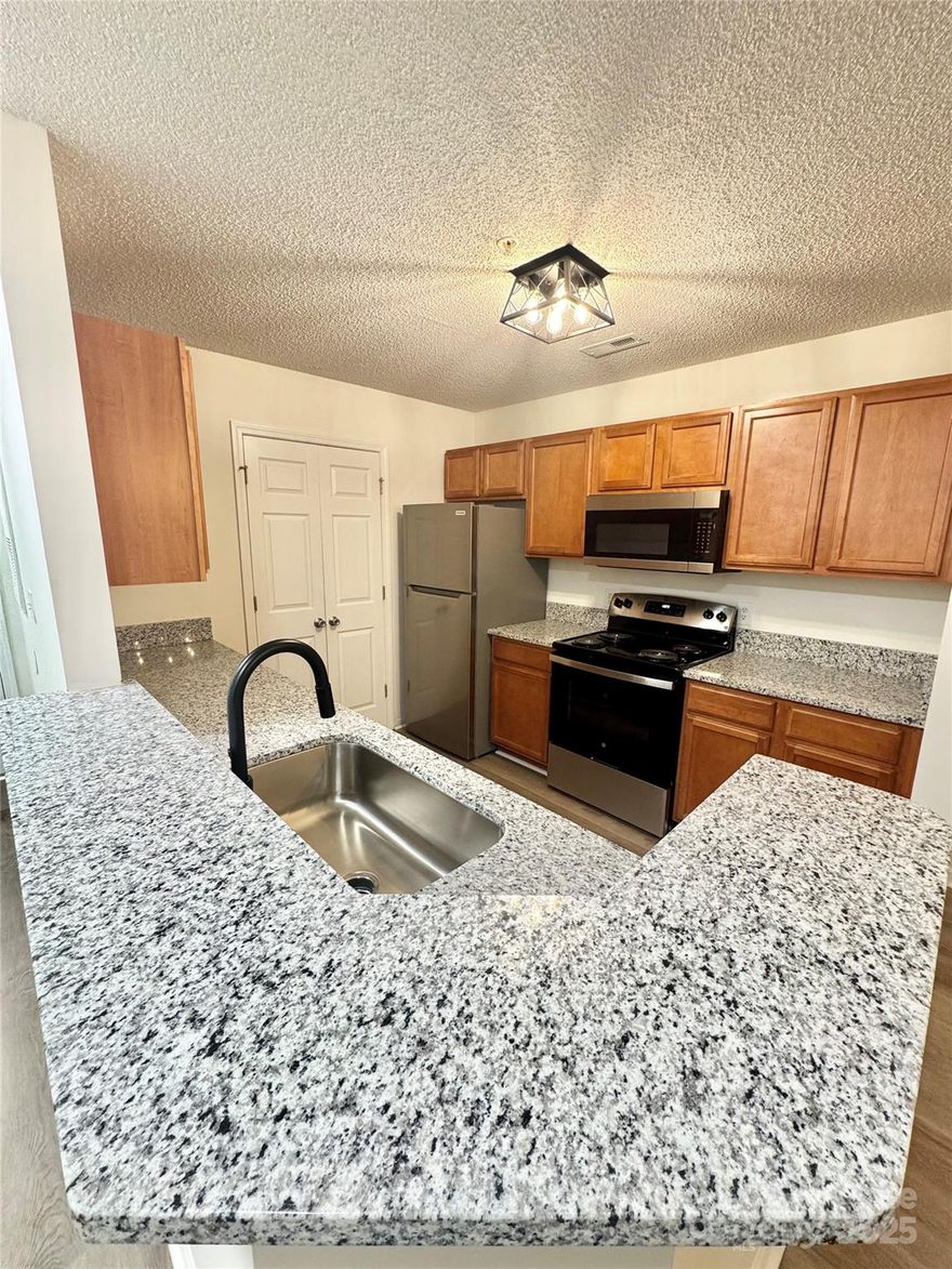 Experience modern comfort in this spacious 3-bedroom, 2-bathroom apartment perfectly located in beautiful Fort Mill, SC. Designed with an open floor plan, this home offers a seamless blend of style and functionality. The kitchen features granite countertops, ample cabinetry, and a contemporary layout ideal for cooking and entertaining. Enjoy the convenience of washer and dryer connections in a dedicated laundry closet and unwind on your private covered deck, perfect for relaxing outdoors. Best of all, this home is pet-friendly, so your furry companions are welcome too! Ideally situated just minutes from Pineville and I-77, you’ll have easy access to shopping, dining, and entertainment.