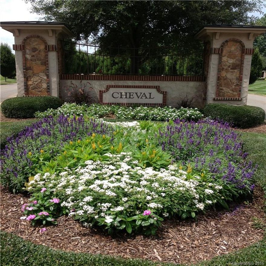 Phenomenal Home Site bordering beautiful Creek with views of 2.3 Acres that are environmentally protected and cannot be built on. Equestrian Center and Pastures.  There are 3.27 unusable acres from the total.