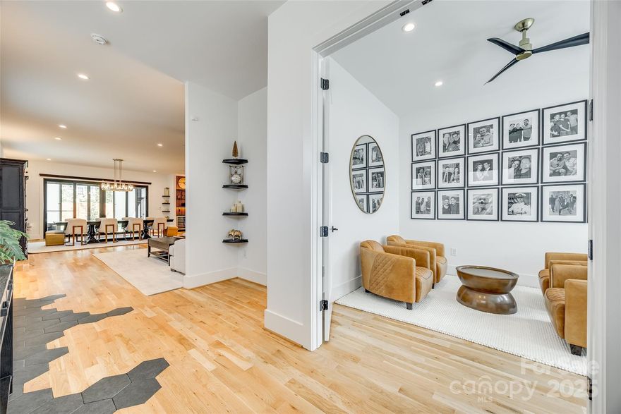 Assumable 5.5%. Seller will pay buyer expenses of $5000 at closing. NO HOA. Stunning Modern Luxury in Belmont near Uptown. 4 bdr, 3.5 bath. Large front porch. Entryway has unique hardwood/tile floors. Office down. Amazing chef's kitchen w/stunning counters & waterfall edge 9 ft island, soft close cabinetry & drawers. Electrolux appliance package featuring dual range, refrigerator, dishwasher & microwave drawer. 2 wine refrigerators at bar area. Drop zone. Pantry w/butcher block counter top and shelves. White oak hardwoods throughout. Privacy frosted windows on main floor. Custom metal railings & tiled rooftop deck. Primary bedroom feature TV soundbar & surround sound. Primary bath w/modern vanities, wet room w/personal shower, free standing tub, & walk in closet. Laundry up w/built in cabinets. 2 car garage w/mini split and ceiling fan. Lutron light switches almost through out. Enter a fenced back yard from the four-season room. Short distance to Greenway trail, shopping & dining.