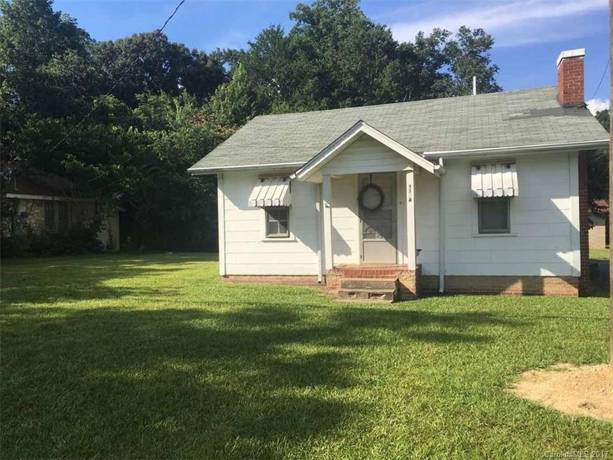 This quaint 2-bedrooms, 1-bath home is ideal for a starter home.  The kitchen cabinets are solid wood and there are hardwoods throughout the home. Conveniently located to the Town of Troy in a nice neighborhood.  The home is on a beautiful large level lot with an outbuilding and fencing on one side.