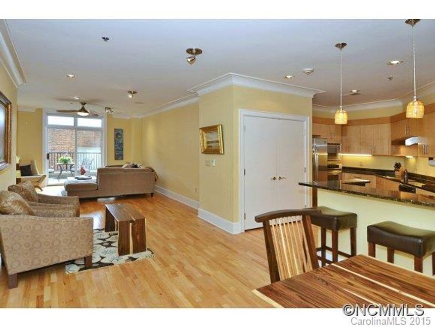 Eastern & Southern Light filled condo that has been recently updated with Porcelain tile in master suite, sunroom, laundry and bathrooms.  Master suite has added pocketdoors and glass block. Upgrades include powder room vessel sink separate from main bath, oversized kitchen sink, new lighting and abundant moldings. Condo comes w/ dedicated parking space, storage room, roof terrace w/ amazing views, and work-out room. Location, location,location!