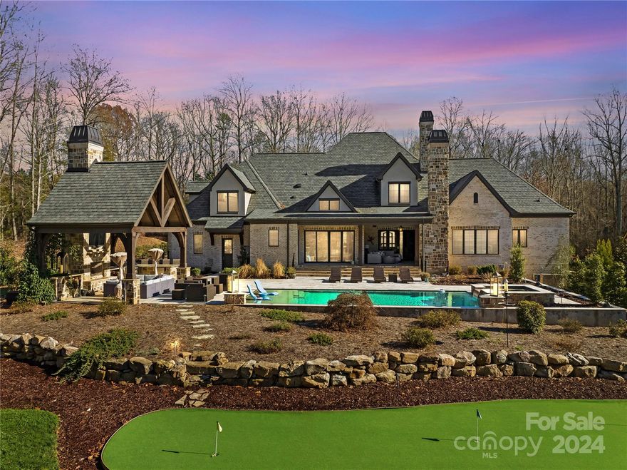 Gorgeous open concept home with outdoor pool, spa and cabana, an entertainer's dream.  This house stuns on every level, from the bar area with exotic granite countertops to the beautiful chef's kitchen with views of the outdoor space, to the stunning wine closest.  Built in 2019 this home shows like new.  The spacious primary suite has access to the screened-in porch, an over-sized walk-in closet and heated floors in the gorgeous bathroom.  A drop zone off the kitchen leads to the 3 car garage with custom cabinets.  A full bathroom has access to the pool and cabana area with fireplace.  All secondary bedrooms are en-suite.  Upstairs flex space can be a gym, craft room, or recreation room.  Large bedroom upstairs with full bath. Walk-in attic spaces provide plenty of storage. 
Golf Membership required.