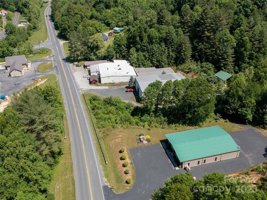 Machine shop with two office buildings. The main structure is a 20,000 sq. ft. facility featuring a large bay with 24’ ceilings and 14’ x 14’ doors on both ends. It is engineered for an overhead crane, with reinforced flooring capable of supporting heavy industrial machinery. The remainder of the building offers insulated ceiling heights ranging from 14–16 feet and includes a built-in 20' x 20' paint room, as well as a small sandblasting room complete with equipment. A shear and a 6’-wide, 20-ton brake are also included. Additionally, there is a small storage room that can serve as a one-room office.
The property includes a 1,250 sq. ft. office area with four rooms, a break room, and two bathrooms. Parking accommodates approximately 20 vehicles, and there are two loading docks suitable for full-size tractor-trailers.
A second, larger office building offers 3,750 sq. ft. with seven offices, a break room, and a conference room.