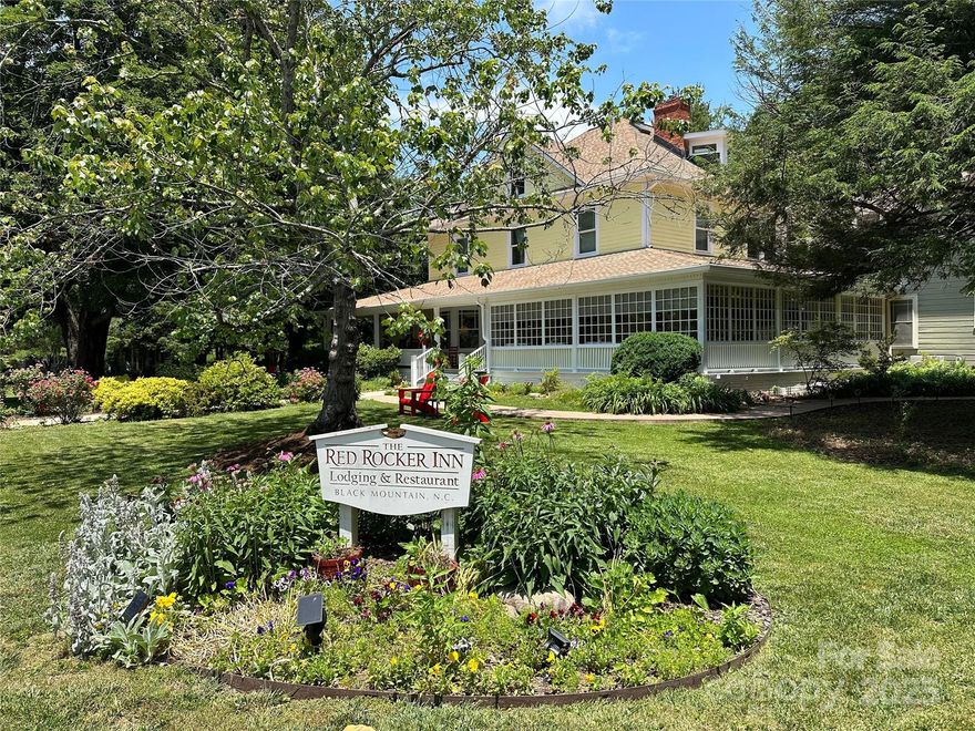 The Red Rocker Inn & Restaurant is a charming Victorian-style inn built in 1896. Known for its distinctive red rocking chairs and front porch, the inn offers 17 comfortable guest rooms featuring antique furnishings and modern amenities. The warm, welcoming atmosphere is enhanced by the innkeepers' exceptional hospitality, ensuring guests feel at home.
Located in the heart of Black Mountain, the inn is an ideal base for exploring the town's shops, galleries, and nearby Blue Ridge Mountains. Special events and customizable packages make it perfect for romantic getaways, family vacations, and group retreats, offering a blend of history, comfort, and culinary delight.
