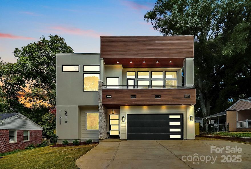 Welcome to your dream home!

This brand-new custom residence offers 3,084 square feet of thoughtfully designed living space, just two minutes from Charlotte Country Club, seven to eight minutes from Uptown, and walking distance to Plaza Midwood — all with no HOA.

Interior Highlights:

Gourmet Kitchen – Quartz countertops, custom cabinetry, stainless steel appliances, gas stove, and custom pantry shelving.

Open Living & Entertaining – Spacious living room with full sliding glass doors opening to a covered patio.

Main-Level Flex Suite – Bedroom or office with a full bath, perfect for guests or work-from-home needs.

Primary Retreat – Spa-like bath with standalone soaking tub, custom tiled shower, dual vanities, walk-in closet with built-ins, and private covered balcony.

Upper Level Living – Two additional bedrooms, a loft area, and a second covered balcony.

Smart Functionality – Full laundry room with cabinets, sink, and washer/dryer, plus custom shelving throughout closets and pantry.

Designer Touches – Super luxury vinyl flooring, designer lighting, and high-end fixtures.

Exterior & Outdoor Living:

Architectural Appeal – Stone veneer, cement board siding, and commercial-grade shingles.

Outdoor Lifestyle – Two covered back patios and two balconies for year-round enjoyment.

Garage & Parking – Two-car garage with utility sink plus a driveway that accommodates four vehicles.

Modern Amenities – EV charger readiness, gas tankless water heater, and fully fenced, sodded yard.

The Perfect Balance:

This home combines luxury finishes, smart design, and energy efficiency in one of Charlotte’s most desirable locations. Whether hosting friends, working from home, or simply relaxing, every detail has been designed with your lifestyle in mind.