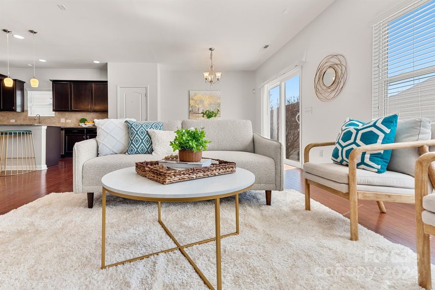 OPEN HOUSE CANCELLED! Showing for back up offers. Welcome home to the perfect retreat in Fort Mill! This 5-bedroom residence offers ample space for everyone. An EAST-FACING (E/NE) home with a fenced-in flat yard is safe for outdoor play plus fresh peaches to enjoy (tree is budding!). Inside, the home boasts a spacious, open layout with hardwood flooring & plenty of room for entertaining or cozy nights. Kitchen features a gas stove, dark cabinetry & an island. Conveniently located on the main floor is the primary suite with his & hers closets. The 2nd bedroom/office on main floor has a full closet, could be used for guests, a playroom, studio, etc. 3 separate bedrooms, a loft and a full bath with dual sinks are upstairs. The epoxy garage floor adds a touch of luxury and durability, perfect for storing bikes, toys & more. Located in a desirable Fort Mill community with low HOA's, this property provides easy access to schools, parks, shopping & dining.