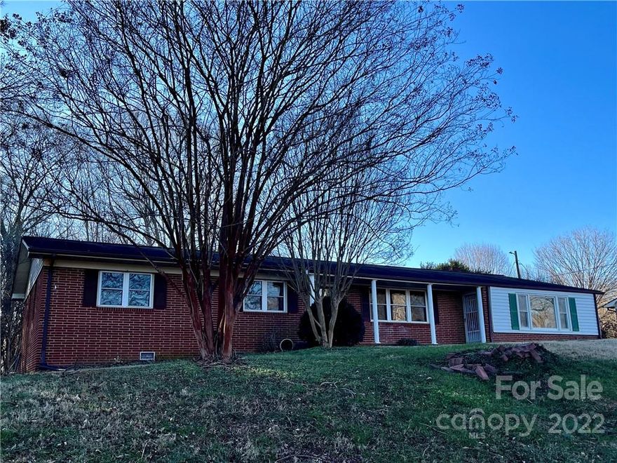 Abundance of space in convenient location! Two separate living areas, 4th BR was originally the LR  Centrally located bath with split vanities and water closets with tub/shower and storage between. Nice windows and doors.  Large level fenced in yard in need of attention.  Home being sold in AS-IS condition!