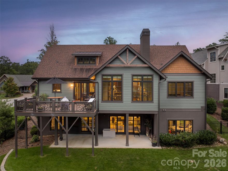 Location, location, location, now offered below tax appraisal, presenting exceptional value. This custom Arts & Crafts luxury cottage in The Ramble at Biltmore Forest blends timeless charm with modern livability in one of Asheville’s sought-after gated communities. Thoughtfully designed for gathering and quiet retreat, the home exudes warmth and architectural character at every turn. Soaring cathedral ceilings, rich wood floors and a light-filled sunroom create an inviting sense of openness, while the flowing floor plan offers effortless everyday living. The main-level primary suite serves as a private sanctuary, complete with a spacious walk-in closet and refined finishes. At the heart of the home, the well-appointed kitchen features classic cabinetry, generous workspace and enduring style. The lower level lives like a fully independent residence, offering three bedrooms, an open kitchen and living area, separate laundry and private exterior access, ideal for multigenerational living, extended stays or guest accommodations. Outdoors, a fenced backyard provides a serene, natural setting ideal for relaxation or entertaining. Just moments away, enjoy walkable access to the community’s premier amenities, including the Living Well Center, scenic trails, parks and Buck Spring Cabin. Elegant, versatile and value-driven, this exceptional home offers a rare opportunity to experience the best of mountain living in a special community.