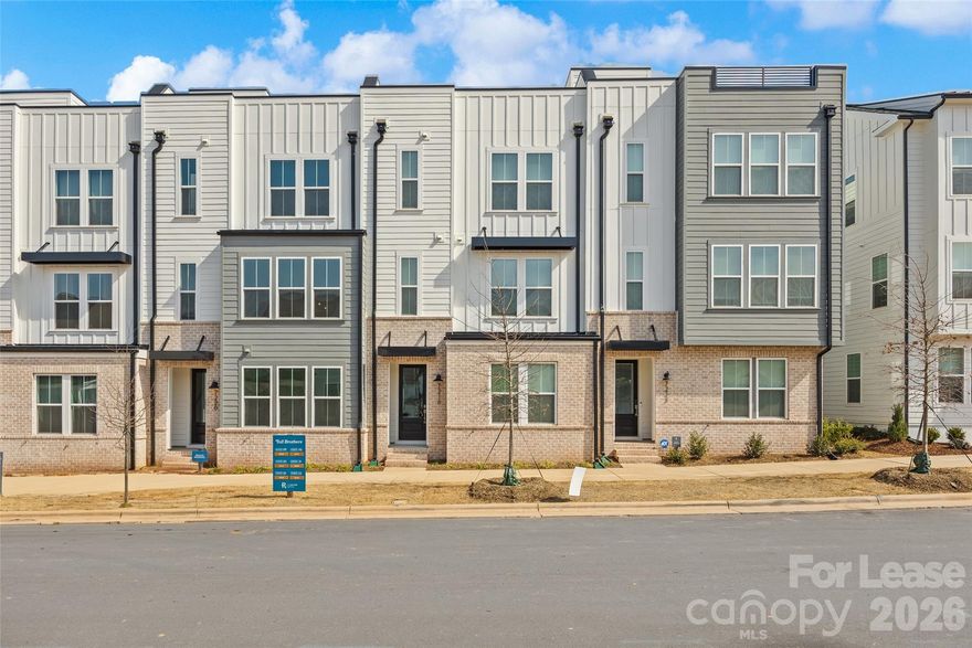 Be the first to live in this stunning new construction 3-story condo rental located in the highly anticipated River District development.

The thoughtfully designed layout features a first-floor guest suite complete with a private bath and walk-in closet—perfect for guests, a home office, or multi-generational living. The main level offers an open-concept kitchen, dining, and living area with seamless flow, highlighted by beautiful finishes, tall door frames, and oversized windows that create a light and airy feel. Step outside to enjoy the second-floor balcony, ideal for morning coffee or evening relaxation.

Upstairs, the deluxe primary suite impresses with dual walk-in closets and a spacious ensuite bath.

Enjoy modern design, elevated details, and the opportunity to live in a growing community where neighborhood amenities will continue to expand over time.