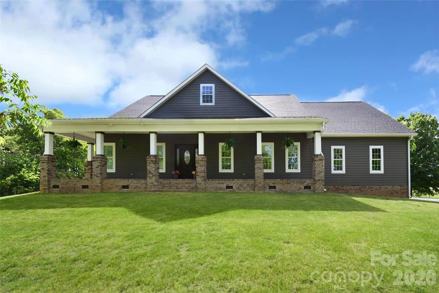 Set on almost 2.5 gated, peaceful acres, this stunning modern farmhouse captures the essence of refined country living—where timeless charm meets exceptional craftsmanship—all just a short drive to Albemarle, Mt. Pleasant, Locust, Concord, and Harrisburg.
Spanning approximately 2,500 square feet, the home welcomes you with a bright, open-concept design that feels both expansive and inviting. Signature farmhouse details—graceful tray ceilings, warm finishes, and thoughtfully curated spaces—create an atmosphere that is equal parts elegant and comfortable. At the heart of the home, the kitchen is a true gathering place, featuring stainless steel appliances, a spacious pantry, and an impressive 7-by-9-foot island with sleek, granite-inspired surfaces—perfect for everything from casual mornings to lively entertaining.
Outdoor living is where this property truly shines. A sprawling covered front porch and wraparound deck embody classic farmhouse living, offering the perfect vantage point to enjoy quiet mornings, evening sunsets, and views of the charming pond below. It’s the kind of setting that invites rocking chairs, slow conversations, and a simpler pace of life.
The owner’s suite is a private retreat infused with rustic elegance, complete with a clawfoot soaking tub, a large tiled shower with multiple rain heads, and dual custom vanities with artisan-style bowl sinks—blending farmhouse character with spa-like comfort.
Built by a licensed contractor with an uncompromising eye for quality, every detail of this home has been carefully considered—from the ¾-inch AdvanTech subflooring (glued and screwed) to enhanced soundproofing within interior walls and precision-finished sheetrock. This is a home designed not only to look beautiful, but to stand the test of time.
Adding even more versatility is the impressive 30-by-40 wired workshop, offering over 1,200 square feet—ideal for hobbies, equipment, or creating your own homestead workspace.
This is more than just a home—it’s a true modern farmhouse lifestyle, where craftsmanship, comfort, and countryside beauty come together in perfect harmony.