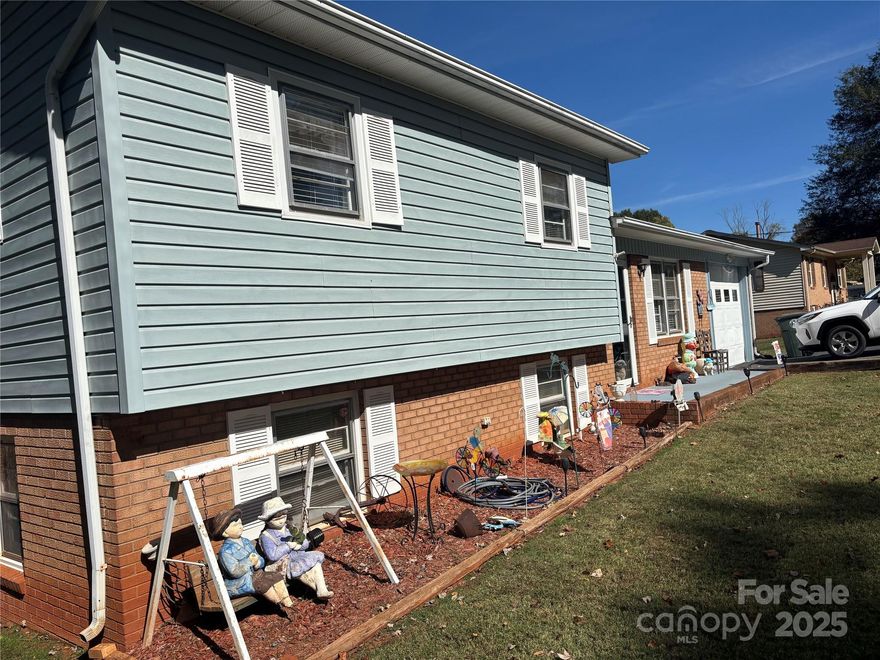 Charming One-Owner Split Level with Pool and Unique Backyard Oasis

Pride of ownership shows throughout this one-owner split-level home! Though the interior reflects its original era, it has been immaculately maintained and is ready for its next chapter. This 3-bedroom, 1-bath home offers a versatile layout and sits in an ideal location close to local conveniences and community amenities.

Step inside to find spacious living areas filled with natural light and endless potential for modern updates. The entry-level one-car garage can easily double as an enclosed outdoor space, perfect for entertaining or relaxing year-round.

Outside, discover a truly unique backyard designed for enjoyment and creativity — featuring a sparkling pool, a small bath house, and a separate storage building, all surrounded by mature landscaping that adds privacy and character.

The lower level includes a roll-up door for additional storage or workshop space, adding even more functionality to this well-loved home.

If you’re looking for a solid home with great bones, beautiful outdoor features, and room to make it your own, this is the one.