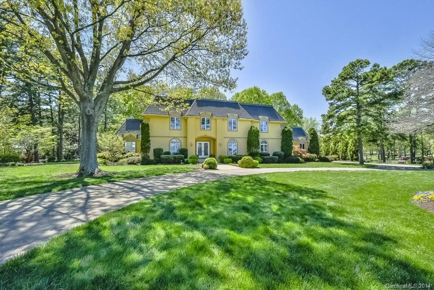 A rare find at Lake Norman! This beautiful 2-Sty home located on a premier 1.25 acre waterfront lot uniquely situated in a quiet cove w/deep water year round. Vast water views of lake yet in a large protected quiet cove shared with 3 homes. This area of 102 ft. of shoreline is ideal for kids swimming & water activities w/almost no boat traffic in the cove. Sunset views in the spring & fall are spectacular. Beautifully landscaped w/flowering trees & shrubs makes for mere shade on hot summer days.