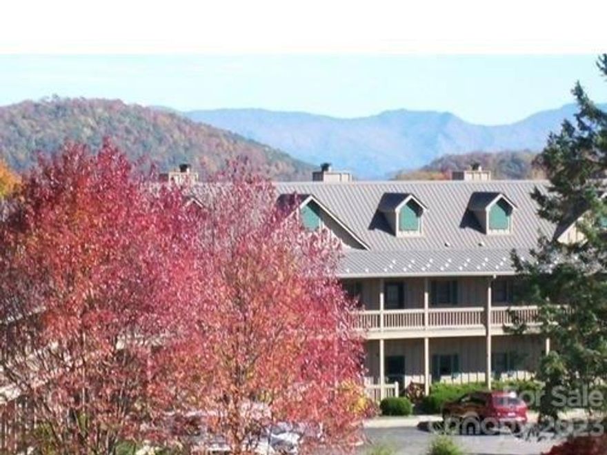 This is a great upper level condo with extreme mountain views from a private, covered deck.  Year round access is all paved, super easy at 4,500 FT elev.  Inside the great room is vaulted with a lovely, dry stack fireplace and gas logs, opening to the deck via glass doors.  The kitchen is tidy with newer appliances, breakfast bar and granite tops.  This unit conveys mostly furnished with a short list of exceptions attached. Newer propane gas furnace, new interior paint and many more upgrades. Non brokers must be accompanied for sec gate.  All restrictions and rules must be obtained from HOA, contact info in disclosure docs.  Amenities require separate, voluntary, paid memberships.  Info can be acquired at WLPOA and Wolf Laurel Country Club. Pets must be approved through the condo board.