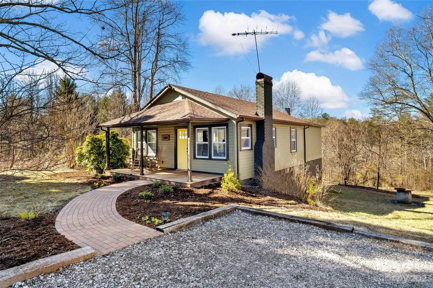 Welcome to this charming 2-bed, 2-bath bungalow. Completely renovated in 2022 with new everything – electrical, plumbing, deck, windows, HVAC and more.

Step into a bright, open living space with a brand-new kitchen and appliances. Master bedroom with master bath and large walk-in closet. The second bedroom, with its own bathroom and access from the hallway.

Enjoy the convenience of a separate laundry room. Step outside through sliding doors to a deck, perfect for outdoor relaxation. The property sits on a combined 2.6 acres, offering mountain views through the back lot, and plenty of room for a mini-farm for outdoor enthusiasts. 

Great potential to develop the grounds into separate lots, create your mini-farm, or turn it into a fantastic vacation rental. This home is move-in ready, combining modern upgrades with classic charm. Conveniently located just 9 minutes from LJ Linville River boat ramp and the town of Morganton.