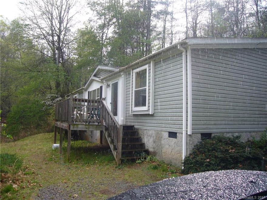 Enjoy the creek and pond from this spacious 3 bedroom, 2 bath home with family room and fireplace.  Large back covered deck, private, yet minutes to outlet mall and restaurants.