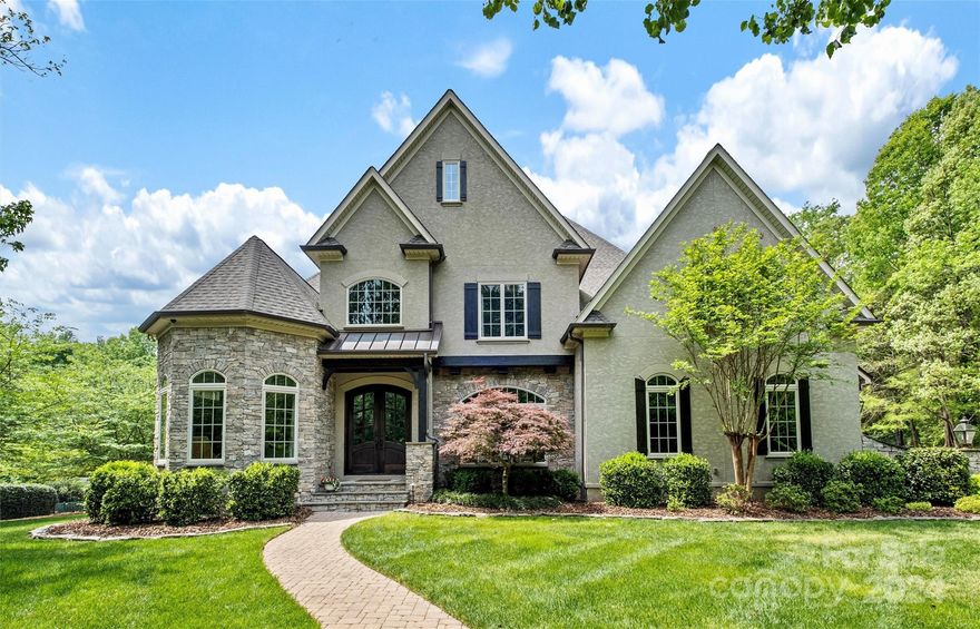 Luxury home on an exceptional lot and location within Providence Plantation. Over 1.5 acres of privacy on this gem of a property. Effortless entertaining & everyday living with a desirable floorplan. Unique/custom finishes throughout. Chef's kitchen opens to great room & sunny breakfast area. Walk-in pantry, butler's pantry includes sink & ice maker. Spacious main level primary suite features beautiful bathroom & dual walk-in closets. Three additional bedrooms plus a bonus/5th bedroom with two Jack-n-Jill bathrooms upstairs. Don't miss the laundry chute, play/hobby room and walk-in attic with extensive storage. Extend entertaining outdoors on the spacious 384sf fireside covered terrace & paver patio with built-in grill. A gas "crystal" fire pit is nestled by the saltwater/heated gunite pool w/deck jets & spa. Landscape lighting, in-ground speakers, locker storage, CAT6, whole home generator, & well for irrigation complete this home. Easy access to Providence Rd, I-485, airport.