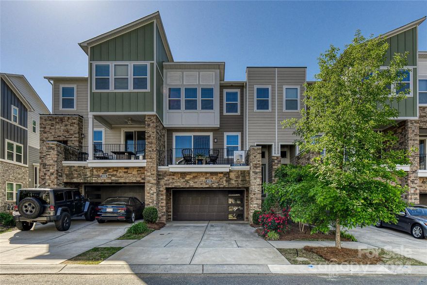 Beautiful, 3 Story, 4 Bedroom, 3.5 Bath Townhome with 2 Car Garage (with storage), located in highly desirable community of Charlotte! Less than 10 min to UNCC! Guest Suite on main level with Full Bath, with access to covered outdoor space to relax & unwind! OPEN Plan on 2nd floor features extremely upgraded Kitchen with quartz counters, custom tile back splash, top of the line stainless steel appliances, oversized center island with seating/storage & tons of cabinetry for storage! Large Great Room & Dining Area with plenty of natural light flowing through! 2 Patios off 2nd floor (one off front & one in back)! Spacious Primary Bedroom on 3rd level with 2 walk in closets & private bath! Spacious Secondary Bedrooms on 3rd level! Full Bath on 3rd level! Townhome backs up to natural tree preserve for peaceful views! Community features private pool & cabana, ponds with walking trails & close to 15 miles of greenway! Conveniently located near UNC Charlotte, restaurants, shopping & I85!