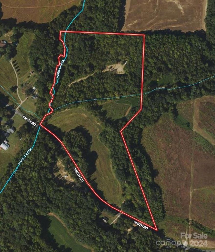 Nestled in the serene outskirts of Kannapolis, NC, this remarkable 29-acre parcel offers a unique blend of open agricultural fields and enchanting woodlands, perfect for those seeking both tranquility and versatility. The land boasts rolling topography, providing picturesque views and a variety of potential home sites. Park Creek runs through the property, adding to its natural charm and offering an idyllic setting for relaxation or recreational activities.

Whether you're envisioning a private estate, a hobby farm,  a nature retreat, or a variety of other uses, this land is a blank canvas ready for your vision. The open fields are ideal for farming, gardening, or pastures, while the wooded areas provide ample privacy and habitat for wildlife. Enjoy the best of both worlds with this stunning acreage that combines the beauty of open spaces with the allure of forested landscapes.