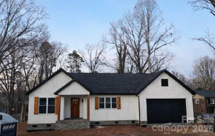 This beautiful new construction home in Cherryville, NC is a must-see! Step inside and immediately feel the comfort and openness of the thoughtfully designed open-concept floor plan, offering seamless flow between the living, dining, and kitchen areas—perfect for everyday living and entertaining. The kitchen is truly the center of the home, featuring elegant quartz countertops, a large gathering island, and stylish finishes that make cooking and hosting a joy. Beautiful flooring runs throughout the home, adding both durability and modern appeal. This spacious 3-bedroom, 2-bath home offers generous living areas and ample closet space. Step outside to the large covered back porch—ideal for morning coffee, relaxing evenings, or hosting friends and family. The two car garage is perfect for keeping your cars protected from the weather. Conveniently located near Cherryville, Shelby, Lincolnton, this home combines comfort with accessibility. Don’t miss the opportunity to add your personal touch—buyers under contract prior to completion may have the option to select paint colors. Completion date should be early April.