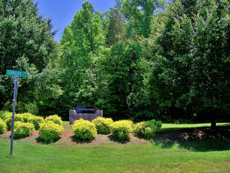 PRICED BELOW TAX VALUE! Beautiful 3 + acre lot in small established community w/custom homes on large lots. Gorgeous hardwoods. Over 400ft road frontage on Sanside. Possible basement lot. Gentle slope. Previously cleared location for homesite. Proposed septic permit on file. Gas, electric & cable @street. Dont miss this opportunity to live in this friendly, quiet community.NO HOA DUES!1600 Sq ft min for 1 sty, 2200 sq ft 2sty