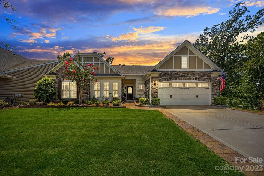 Beautiful & tranquil homesite on a quiet cul-de-sac just off of the Catawba River. Upgrades include neutral paint, a custom office w/ built-in desks & shelving, stone-accented gas log fireplace in the spacious great room, SS appliances & granite counters in the eat-in kitchen, beautiful sunroom overlooking the wooded view, screened porch w/ tile flooring, & extended paver patio w/ sitting walls! Other kitchen features include a gas cooktop, wall oven, tile backsplash, maple cabinets, & bar area. The primary suite has a tray ceiling & a bath w/ a glass enclosed shower, garden tub & walk-in closet w/ built-ins. 2 guest bedrooms & a hall bath are great for your guests. More features include rececessed lighting, extended garage w/ epoxy, irrigation system, and a laundry room w/ a sink, cabinets & a folding table. From the comfort of your backyard, you can hear the river flowing. There are stunning river views in the winter, beautiful fall leaves, & incredible sunsets year round- dont wait!