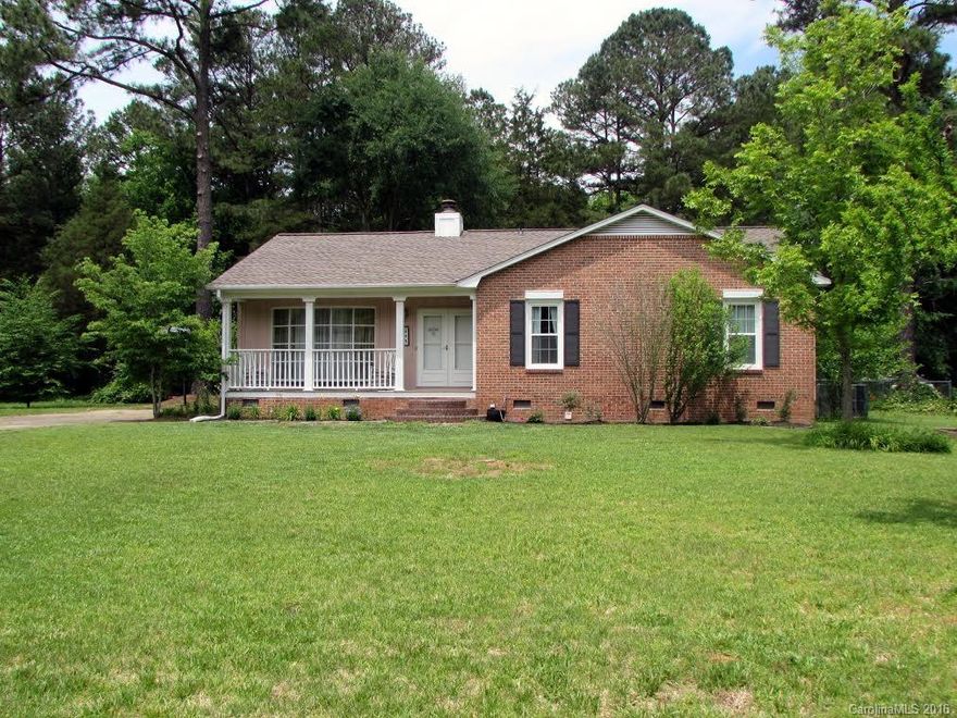 LOCATION!!!! Very well maintained home that is ready for you!!! Home offers open living room to dining, spacious kitchen, beautiful brick fireplace and so much more. Enjoy your evenings on the screened back porch or start your "honey do" list in the large utility building. This one won't last long!!!!