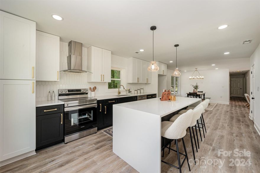 Welcome Home to this beautifully renovated home. It has technically 2 beds, a bonus room (with closet) and two baths with over 1600 SF this home feels very spacious. The home sits on a perfectly level corner lot of almost 1 acre. Sip your tea or coffee in the most beautiful front porch as you watch the sunrise. This house has a beautiful open floor plan and the kitchen island is to die for! Every detail was carefully drafted to created a home full of light. Multiple windows around the house for natural light and an spacious feel. Enjoy the huge back patio for a more private outdoor space. It also has a slab in the back if you want to put a shed or a gazebo! Overall this is one of my favorite listings of all time and is just looking for the right buyer!