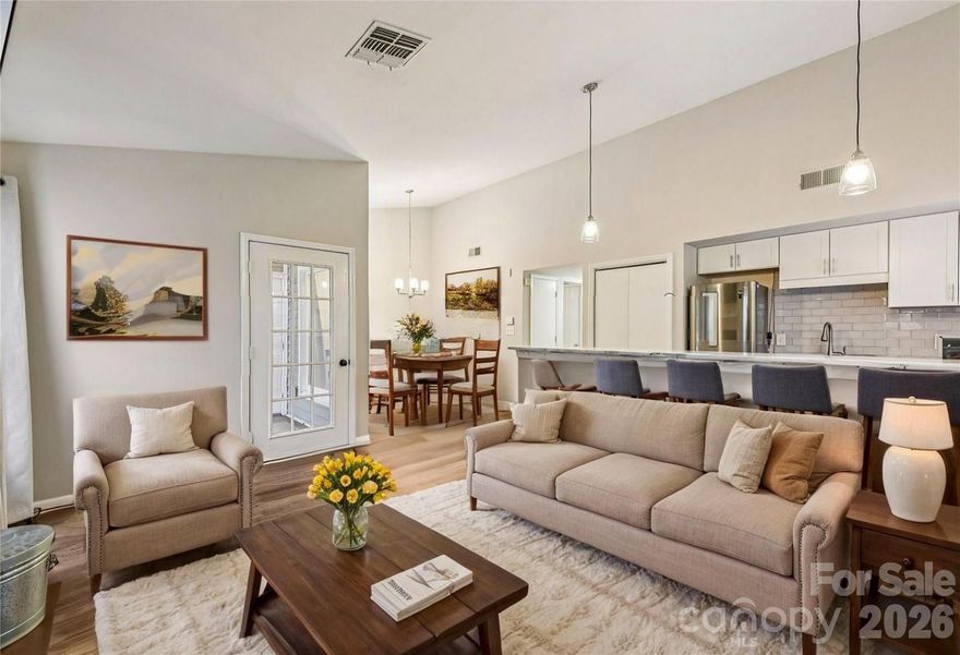 Light-filled end-unit condo in the heart of Myers Park. This 2BR/2BA home offers a bright, open layout with vaulted ceilings, a cozy fireplace, and large windows that bring in abundant natural light. LVP flooring throughout adds a modern, low-maintenance feel. The updated kitchen features granite countertops and stainless steel appliances, flowing seamlessly into the main living space—perfect for everyday living or entertaining. Spacious bedrooms include a private primary suite with walk-in closet and ensuite bath. Enjoy the covered front porch surrounded by mature oak trees. Unbeatable location near shops, restaurants, parks, Queens University, and greenway access, with quick drives to Uptown, SouthPark, the airport, and major medical centers.
Low HOA covers water, sewer, exterior maintenance, trash, landscaping, community pool, and parking.