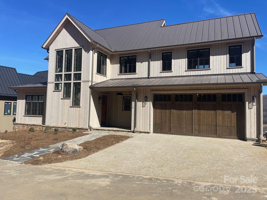 Beautiful new construction home built in the highly coveted Doubletop Village at Balsam Mountain Preserve.  Just minutes from all the action, this home boasts incredible long range mountain views, a covered porch with outdoor kitchen and plenty of room to entertain your friends and family.  Each generous en-suite bedroom has walk in closets and gorgeous custom bathrooms.  No detail was overlooked in the design of this home. Balsam Mountain Preserve is a private 4,400 acre club community with 3,200 acres of conservation land and completed amenities including an Arnold Palmer golf course, The Summit House and Mine Tavern restaurants, wellness and equestrian centers and over 40 miles of hiking trails.