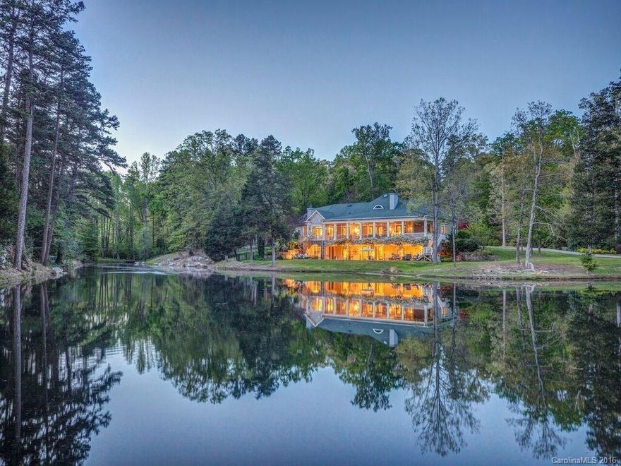 54 acre gated equine estate with updated/remodeled home-refinished hardwoods, new paint, backlit built ins, eat-in kitch w/ FP overlooking pond w/ waterfall and pool. Enjoy huge screen porch overlooking pond/pool. Remodeled caretaker/guest home on property w/ 2br 2ba. NEW white PVC fence, 15 stall barn w/ tack room, wash area,fly-spray & Nelson auto watering systems, tractor shed, shavings storage, birthing stall, 4 ponds,riding trails,lrg grass+ 2 riding/jump arenas,+5 stall barn w NEW siding.