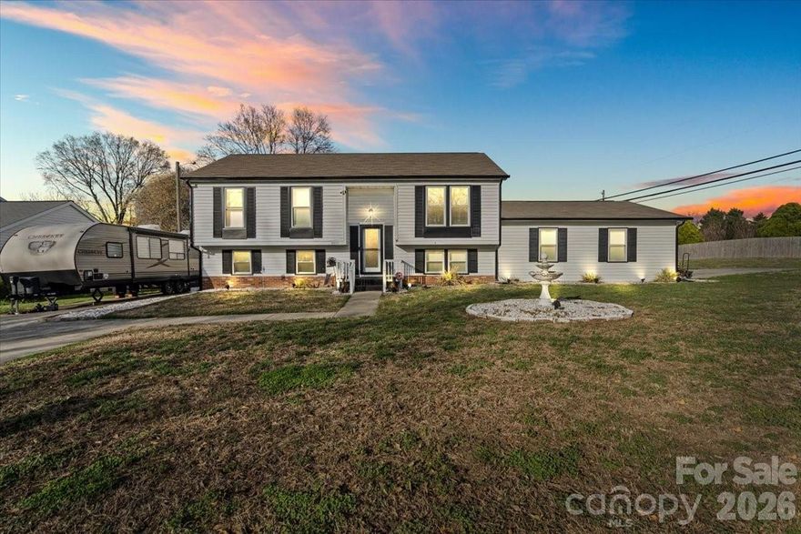 Corner lot with two driveways, an entertainer's backyard, and flexible living space is waiting for you! Inside you will find updated flooring throughout with an inviting layout designed for comfortable everyday living. The versatile flex room on the lower level provides the perfect space for a home office, workout area, playroom, or additional living space. The home truly shines when it comes to outdoor living and entertaining. Step outside to an enclosed deck, ideal for relaxing or hosting gatherings year-round. The large backyard features a privacy fence, creating a peaceful retreat with plenty of space for pets, play, or outdoor activities.

The home has updated features including new windows 2020, french drains 2021, water filtration system 2022, new roof 2022, and outside HVAC condenser 2023