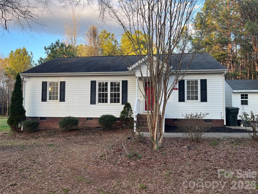 Tucked away on a peaceful wooded property in York, SC, this charming one-level home offers 1,209 square feet of comfortable living with a desirable split-bedroom floor-plan. Built in 2009, the home features 3 bedrooms and 2 full bathrooms, providing both privacy and functionality.

The spacious primary suite is located on one side of the home, while the two secondary bedrooms—featuring brand-new carpet installed in 2026—are situated on the opposite side. The main living areas flow easily for everyday living and entertaining.

Enjoy the beauty and privacy of the surrounding trees, along with the adjoining lot (217 Nottingham) which is included in the sale, featuring a large open clearing—perfect for outdoor activities, future expansion, or simply enjoying the extra space. Together, the two parcels create a generous .773-acre property with plenty of room to spread out.

Additional updates include a new water heater and new flooring in the primary ensuite, both installed in March 2026. 

If you're looking for single-level living, privacy, and extra land in a convenient York location, this property is a must-see.

A third lot is also available if the buyer wishes to purchase an additional 2.11 acres (215 Nottingham Dr).  Note that the third lot contains a structure of no value that encroaches onto the property in this listing.  Recommend the buyer conduct a survey to determine the extent of the encroachment.

Washer and dryer do not convey.