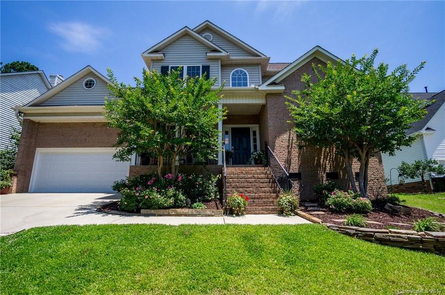 WOW!! Completely Updated home on Tega Cay Peninsula. Beautiful Kitchen and Master Bathrooms. New Bamboo Flooring, Carpeting and New Roof, all in 2016/17.  Entertain in this Large Private Backyard with a Wooded Easement, and Walking path to the Lake. Tega Cay Offers... Golf, Waterfront Parks, Marina, Club House with Restaurant, Tennis and Swimming. Convenient to I77 and Uptown Charlotte. Top Rated Fort Mill Schools and low SC Taxes.