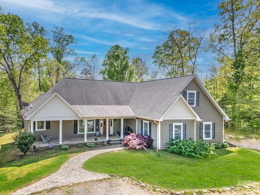 Looking for 2 creeks with mountain privacy? 36+ acres to hunt, trap, hike, ride horses- you've found it! Access to Broad River on several locations across the road for fishing, swimming and tubing. Just minutes away from Lake Lure with its beach, dining and zip lining. This custom built 3 BR home has huge storage capability with easy access to a walk in attic. Could easily be finished out for additional living space. Wonderful property for primary residence, mountain getaway or possible business opportunity for the entrepreneur on the lower portion of the property (maybe a campground, tiny homes or cabins?) while living above in a private setting. Large screened porch for grilling with your friends. Enjoy outdoor living at its best!  Den could be used as another sleeping area.    Portion of property currently having partial timber clearing with possible additional homesite. Old cabin on lower portion is now a chicken coop. Goats, chickens and turkey behind house.