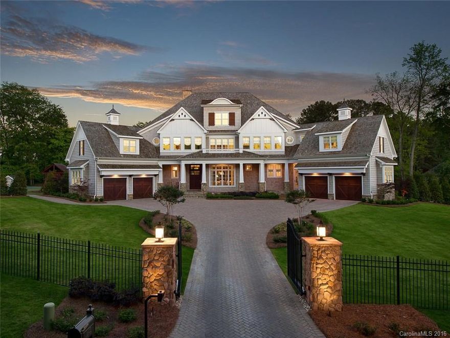 Wonderful nearly 2 acre fully fenced property in gated 7 Eagles. Built in 2015 on hole #5 on Quail Hollow Golf Course. Open floor plan with 12' ceilings down and 10' up. Thermadore kitchen w/quartzite tops, 5 BR 5.2 BA, 3 fireplaces, wine cellar, generator, elevator, 3 covered porches, extensive mouldings/millwork throughout. Gated brick paver drive and golf cart path w/remote access. Extensive security/AV system.