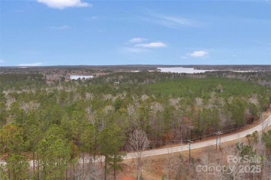 Large +/- 24.5 Acre lot in the highly desired Lake Wateree area for Sale! With a Ridgeway address, you will be minutes away from Colonel Creek Landing (Lake Wateree access), gas stations, Lake Wateree Park, and other modern amenities! Easy access to HWY -21, I-77. Private wooded lot for your custom dream home. If you are looking for a peaceful homesite, this is the land for you! About 900' of road frontage which creates easy access. There is a gate and a driveway already installed at the front. There are electrical and internet utilities available at the street. With the large lot size, pursue building your dream home, use this land for your small farm and other gardening activities. This place is loaded with both large and small game. Public boat ramp to the lake is right around the corner. *Subject rot Survey**More land available for sale*.