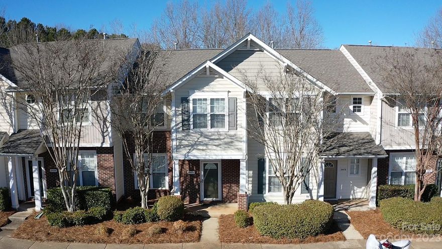 Beautiful two-story townhouse, nestled in the desirable Villages at Avonlea, showcases great finishes and open floor plan. Experience urban living in Charlotte with this pristine 3-bedroom, 2.5-bathroom residence. Kitchen features granite countertops, tile backsplash, and a welcoming breakfast bar. Ample natural light floods the home, enhancing its airy ambiance. The ground level has gorgeous laminate wood flooring, creating a seamless flow into the cozy living room, perfect for relaxing by the fireplace with a soft blanket. The upper level boasts a spacious primary bedroom suite, complete with a generous walk-in closet. Additional storage needs are effortlessly met by the external unit attached at the back of the house. Its prime location is just a stone's throw from various shopping and dining options, with easy access to I-77, I-485, and the heart of Uptown Charlotte!