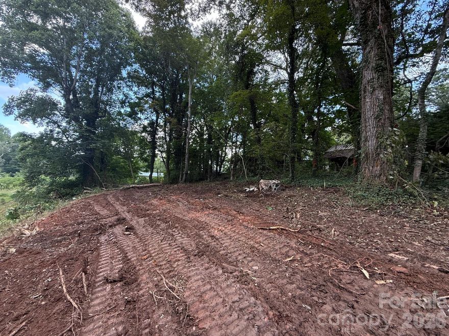 Partially cleared, unrestricted land ready for your plans!
Perfect spot for a tiny home, camper, mobile home, or mountain getaway.  There is road access from Tunnel Road, ensuring easy access to the property.  Only minutes from downtown Marion for shopping, dining, and essentials.  Outdoor lovers have easy access to nearby hiking trails and Lake James is a short 20-minute drive.