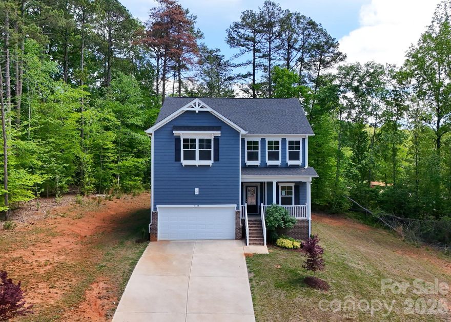 Beautifully designed 4-bedroom, 3.5-bath home situated on a spacious 0.41-acre lot, offering privacy, space, and modern living! This thoughtfully laid-out home features an open-concept floor plan with a bright and expansive living area that flows seamlessly into the kitchen—perfect for both everyday living and entertaining.
The kitchen is equipped with modern cabinetry, ample counter space, and a large island, making it the heart of the home. Upstairs and main living areas offer generous space, while the primary suite features a dual vanity and well-appointed bath designed for comfort.
Enjoy the outdoors with a large lot backing to natural surroundings, providing a peaceful setting and added privacy—ideal for relaxing or hosting gatherings. The home also features a 2-car garage and a welcoming front porch, adding both convenience and curb appeal.
Located in a growing area with easy access to major highways, shopping, dining, and everyday essentials, this home offers the perfect balance of space, comfort, and accessibility.
Don’t miss this opportunity to own a move-in-ready home with room to grow—schedule your showing today!