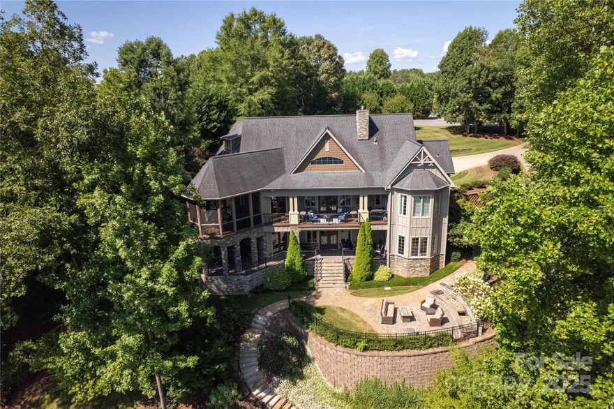 OFFICE EXCLUSIVE entered for COMPS. Gorgeous, waterfront, custom home on Moss Lake with open floor plan, vaulted ceilings and fireplace, high end kitchen w/ Wolf and Subzero appliances, Walker Woodworking cabinetry, 12' ceilings, drop zone, huge laundry room, and primary suite on main w/ jacuzzi tub and two walk in closets. Basement with family room and two additional rooms and bathroom.  Tons of storage!  Basement garage for lake toys! Huge FROG with bathroom is another separate suite! Fabulous outdoor entertaining w/ screened porch off kitchen, covered porch off family room, and patios everywhere! Extensive landscape design with irrigation and water feature on a patio overlooking lake.  Engineered drainage system for water runoff management. Custom oversized dock w/ covered & uncovered entertaining areas, boat lift, and jet ski slips. Three-car primary garage.  Septic permitted for 3 bedroom but additional bonus room with closet in basement. Truly a dream home!!!  See docs for more!