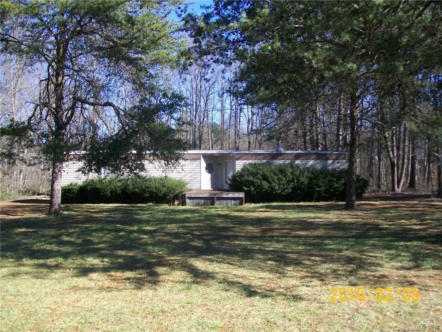 Single wide in need of repairs. Estate must close with estates' attorney. Very little value given for single wide "sold as-is". Must close with estate attorney.