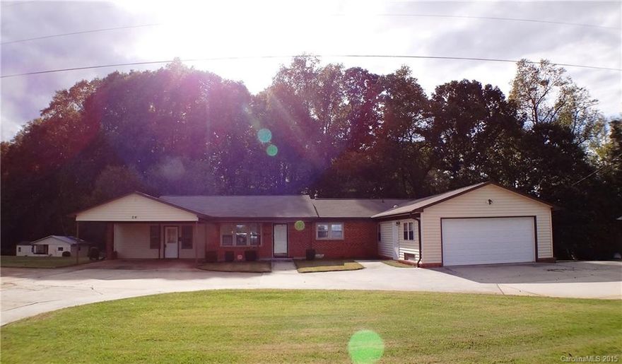 Need lots of space, look no further.This home has a formal living room and a cozy den with fireplace.Property has 4+ bedrooms but can only be listed as 3 bedrooms due to septic permit.Two car garage and two car carport both attached to house.Basement can be used as a second living quarters.Two laundry facilities in property.Four full baths.Two baths are handicap accessible. Seller offering to pay up to $5000 in closing cost with acceptable offer.Must see to appreciate space.Close to I-40 & I-77.